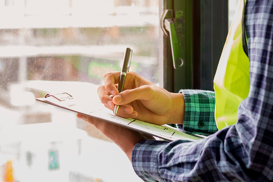 inspector-writing-on-clipboard-corry-pa